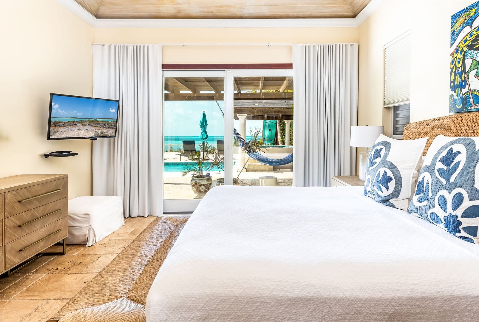 Lower suite bedroom with hammock and pool view