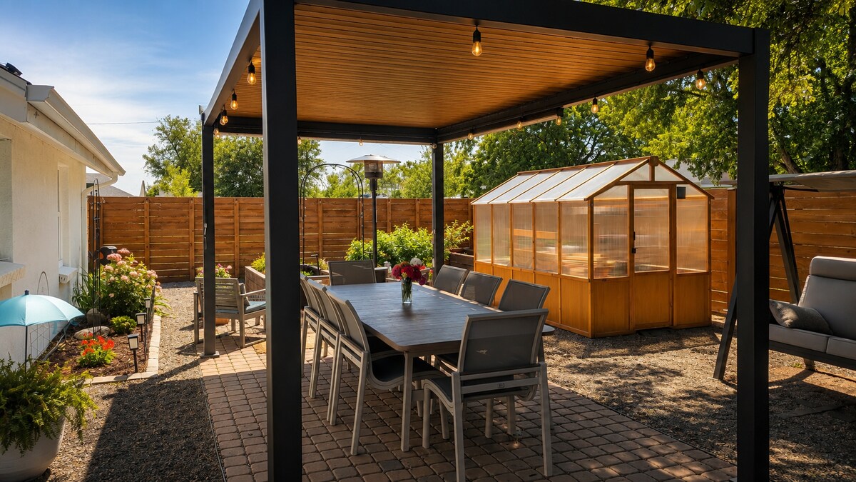 Renovated shared backyard with pergola, swing, and large dining table